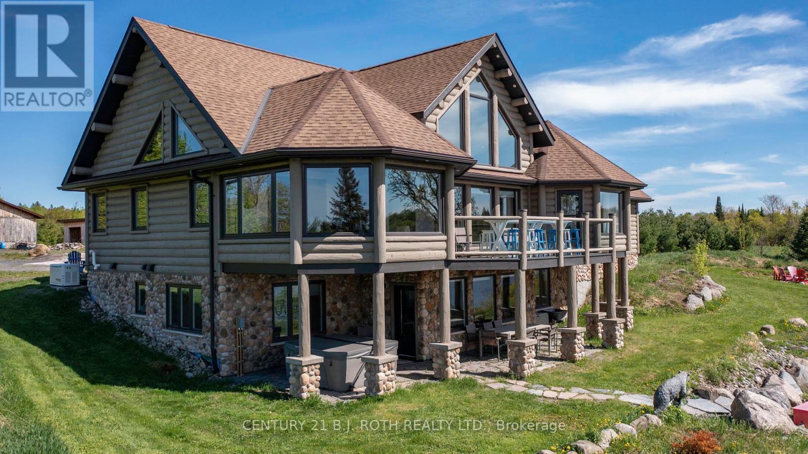 64 Mccords Road, Mckellar, ON - Outdoor With Deck Patio Veranda