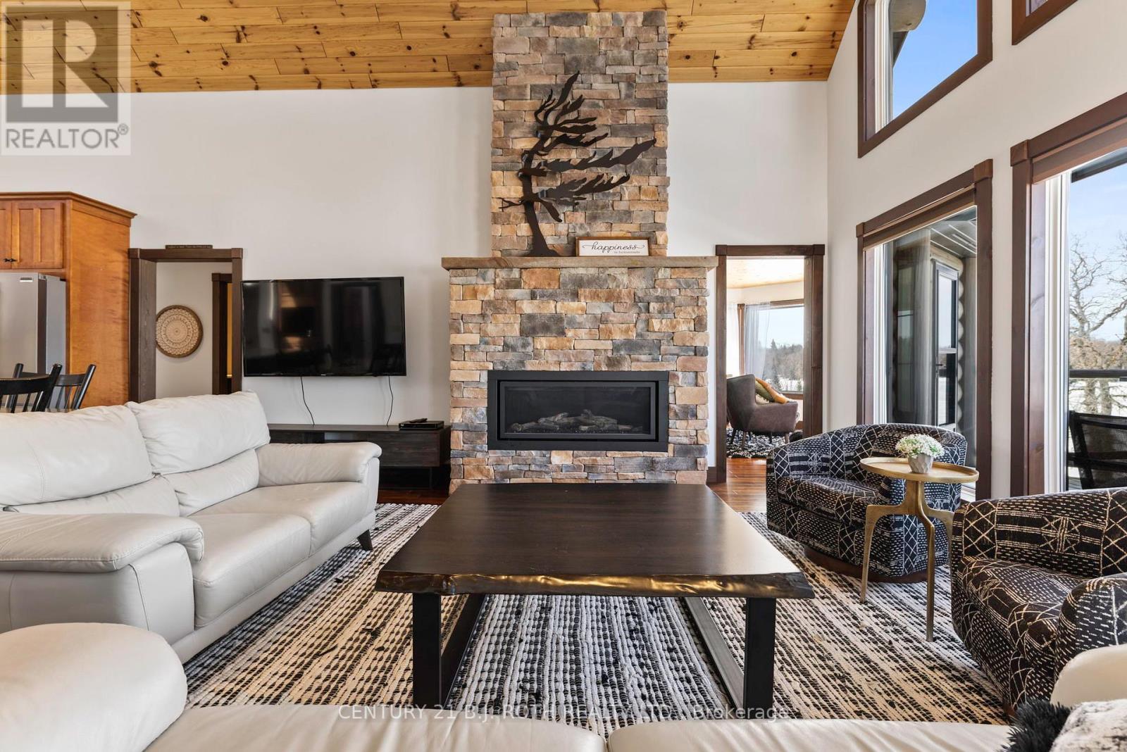 64 Mccords Road, Mckellar, ON - Indoor Photo Showing Living Room With Fireplace