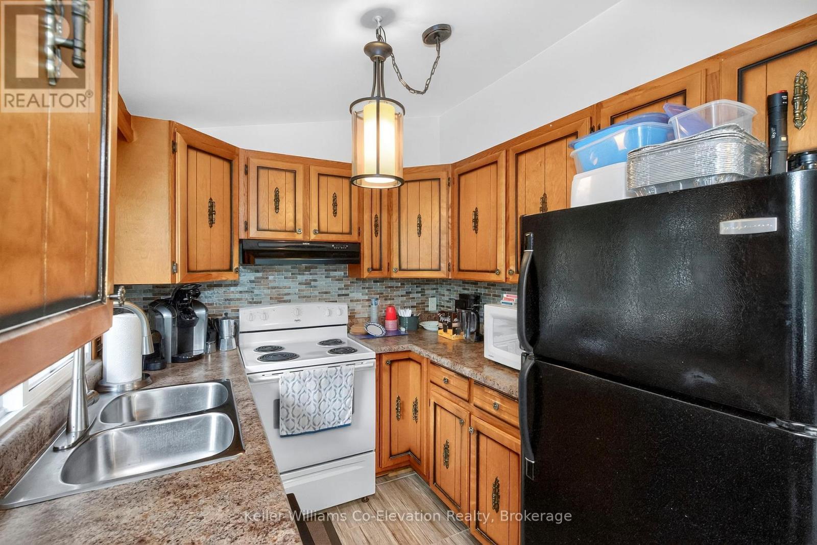 1950 Champlain Road, Tiny, ON - Indoor Photo Showing Kitchen With Double Sink