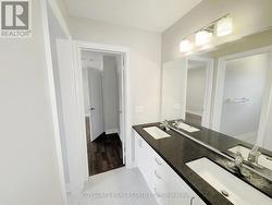 Shared Bathroom between Bedrooms #3 & #4 -
