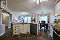 Kitchen Island With Sink and Dishwasher -