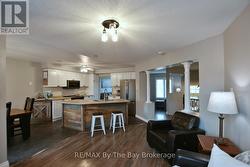 Open Concept into Dining Area and Sitting Area -