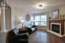 Sitting Area with Gas Fireplace of Dining Room -