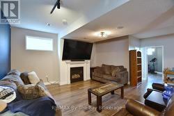 Seating Area on Lower Level with Gas Fireplace -