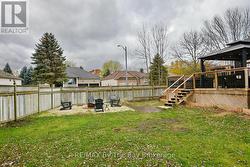 Fully Fenced BackYard with Fire Pit Area -