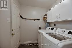Laundry Room off Foyer with Garage Access Door -