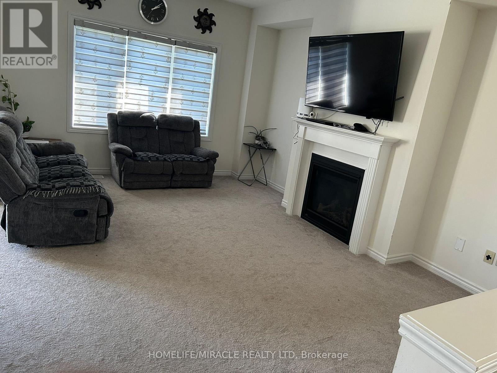 29 Jenner Drive, Brant, ON - Indoor Photo Showing Living Room With Fireplace