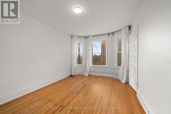 Primary bedroom with bay window -