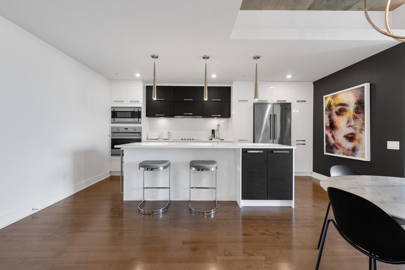 Cuisine - 404-2200 Rue Harriet-Quimby, Montréal (Saint-Laurent), QC - Indoor Photo Showing Kitchen With Upgraded Kitchen