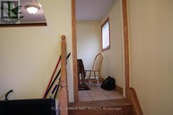 Utility room stairs leading to dining area -
