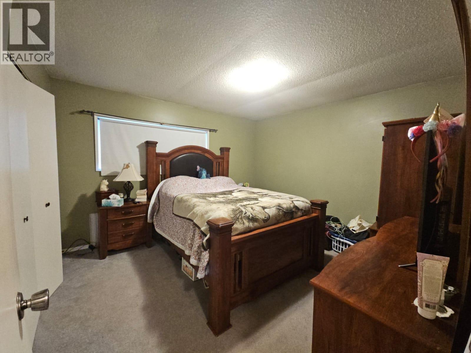 6327 Wildmare Sub, Chetwynd, BC - Indoor Photo Showing Bedroom