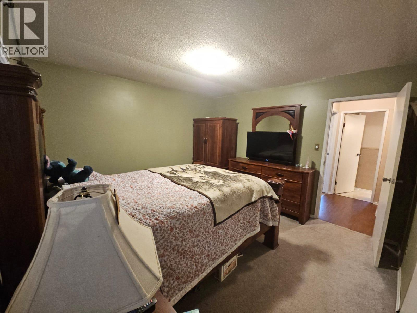 6327 Wildmare Sub, Chetwynd, BC - Indoor Photo Showing Bedroom
