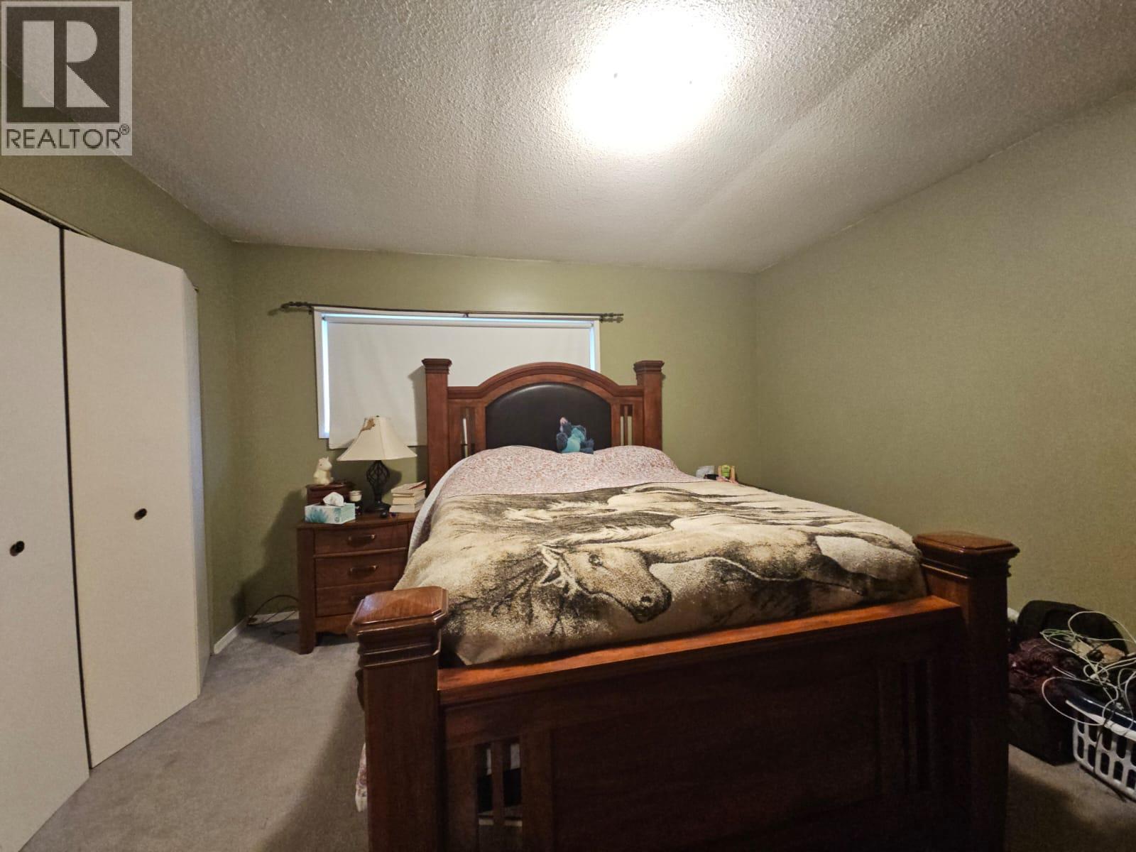 6327 Wildmare Sub, Chetwynd, BC - Indoor Photo Showing Bedroom