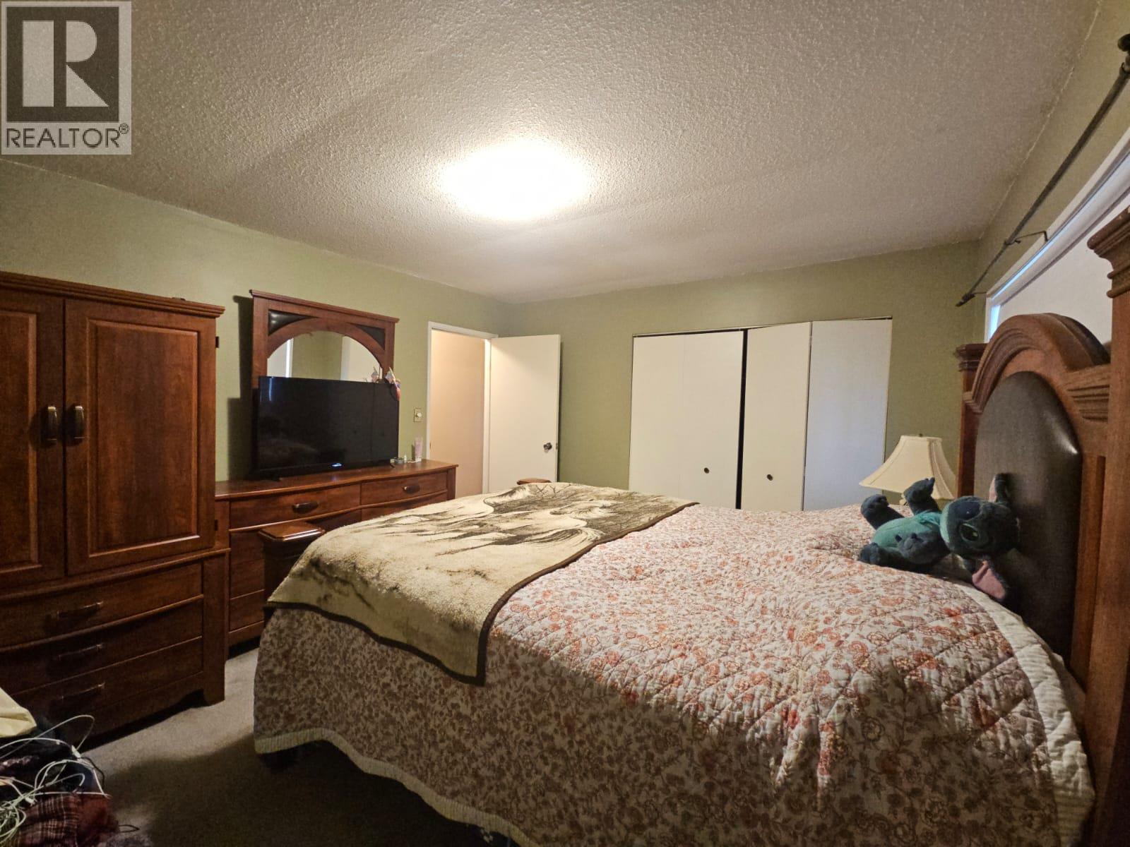 6327 Wildmare Sub, Chetwynd, BC - Indoor Photo Showing Bedroom
