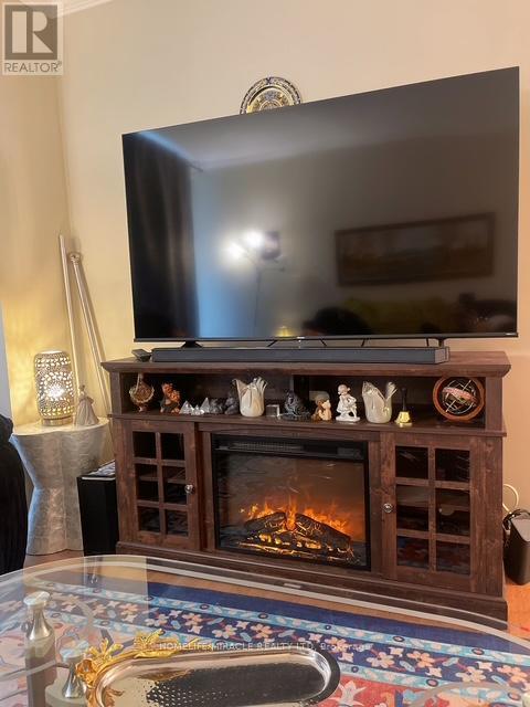 207 - 44 Falby Court, Ajax, ON - Indoor With Fireplace