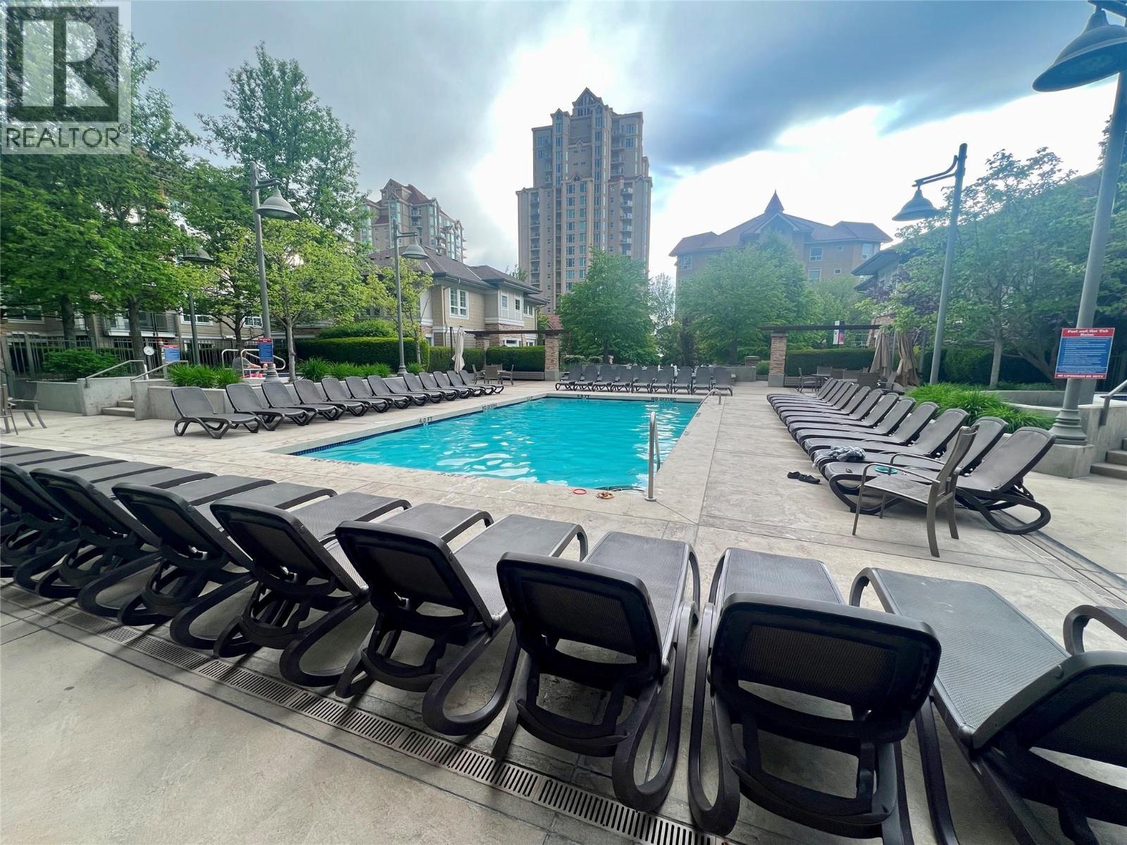 1075 Sunset Drive Unit# 1803, Kelowna, BC - Outdoor With In Ground Pool