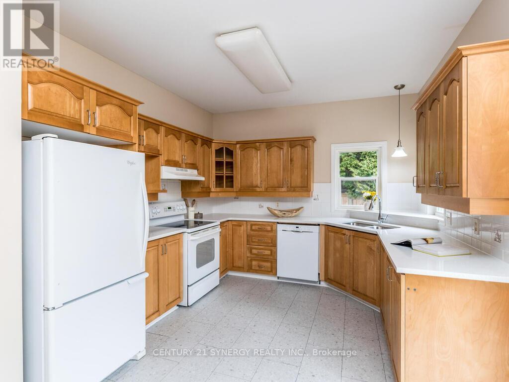 Beautiful new quartz counters and flooring. - 34 Eliza Crescent, Ottawa, ON - Indoor Photo Showing Kitchen With Double Sink