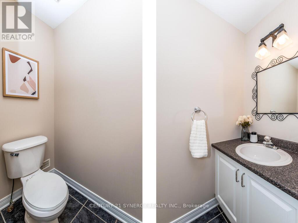 Powder room located by the stairs to the basement. - 34 Eliza Crescent, Ottawa, ON - Indoor Photo Showing Bathroom
