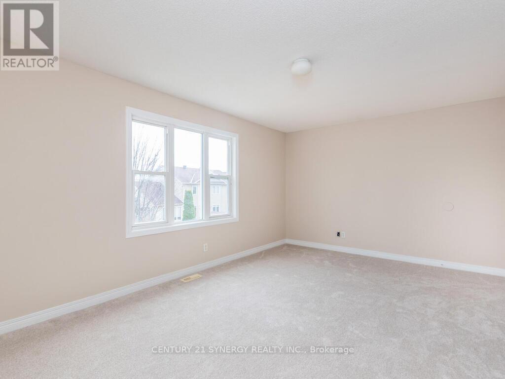 Primary bedroom overlooking the back yard. - 34 Eliza Crescent, Ottawa, ON - Indoor Photo Showing Other Room