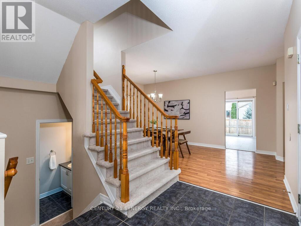 Past the stairs to dining room, note powder room. - 34 Eliza Crescent, Ottawa, ON - Indoor Photo Showing Other Room