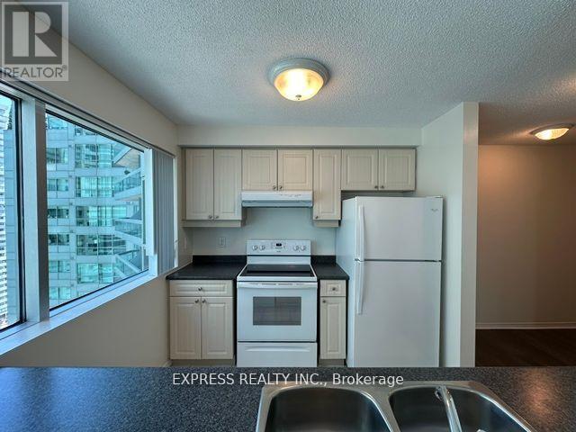 2011 - 10 Queens Quay W, Toronto, ON - Indoor Photo Showing Kitchen With Double Sink