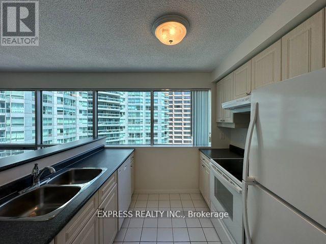 2011 - 10 Queens Quay W, Toronto, ON - Indoor Photo Showing Kitchen With Double Sink