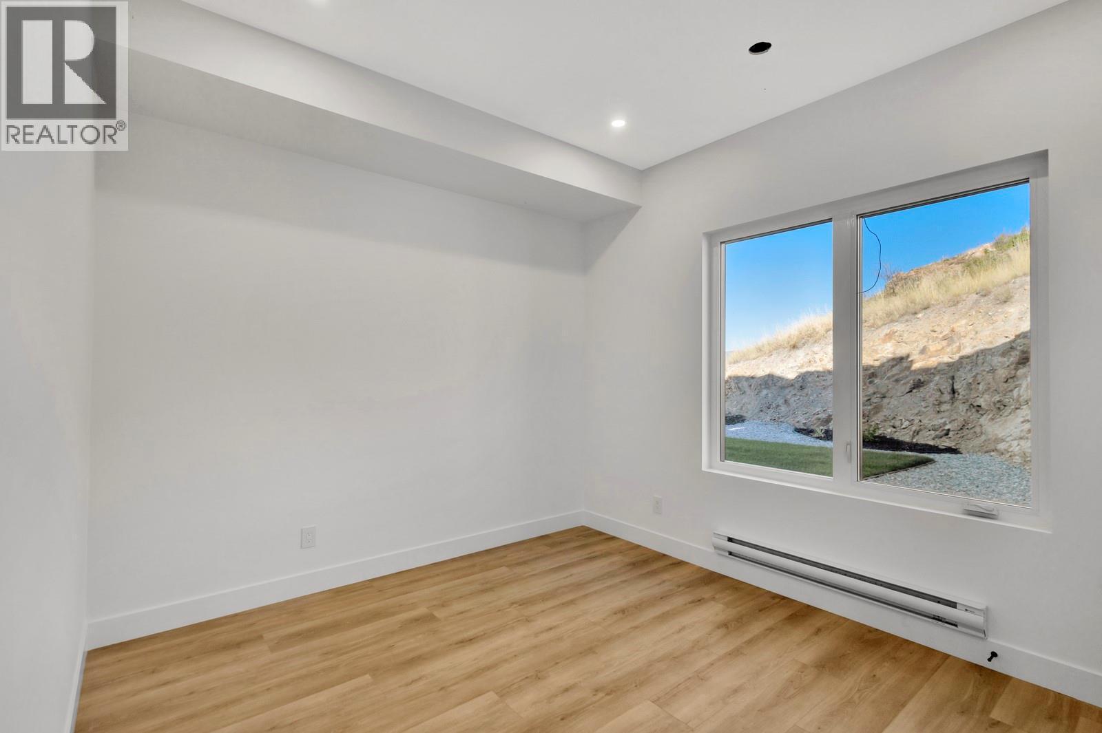 1122 Pearcy Court, Kelowna, BC - Indoor Photo Showing Other Room