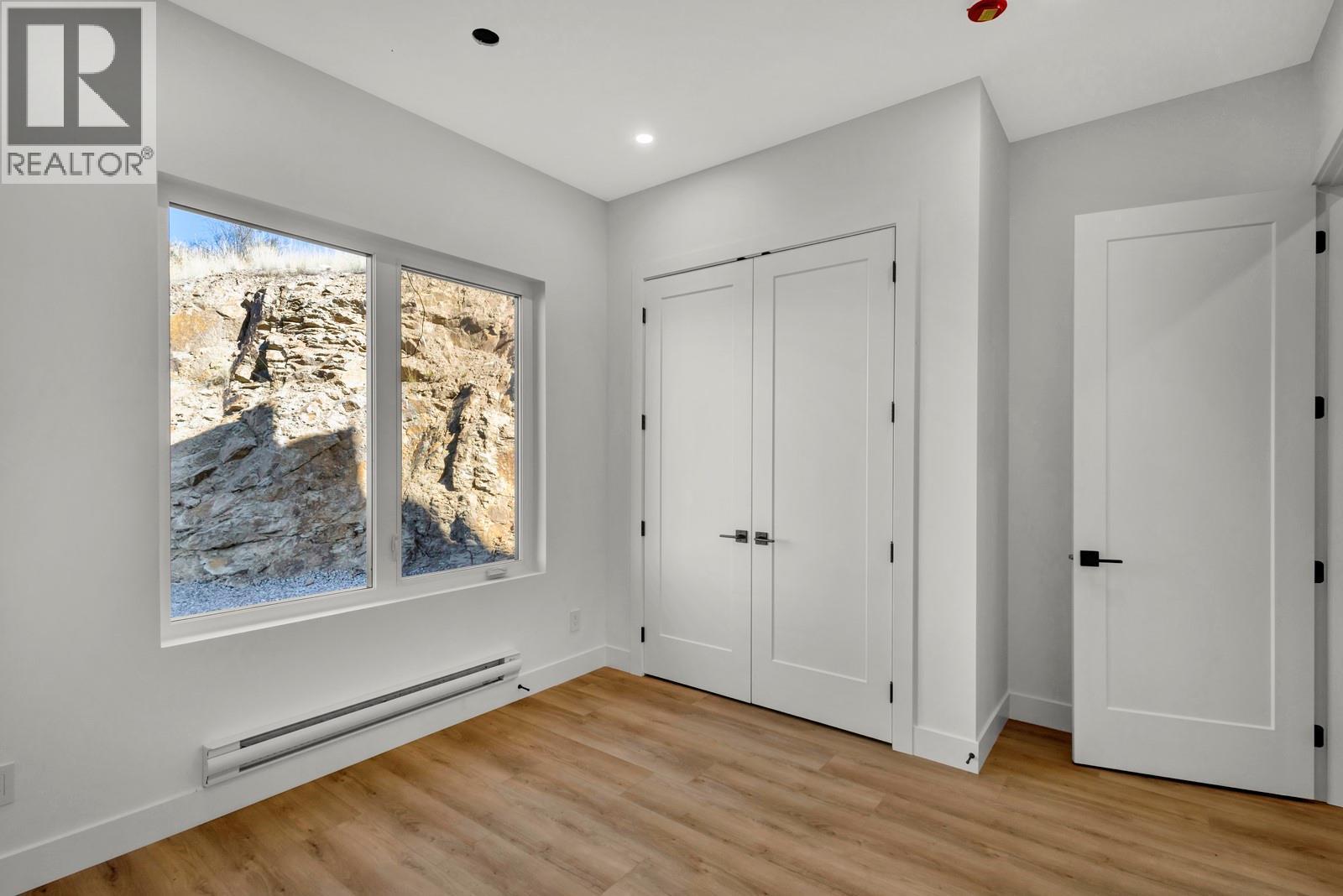 1122 Pearcy Court, Kelowna, BC - Indoor Photo Showing Other Room