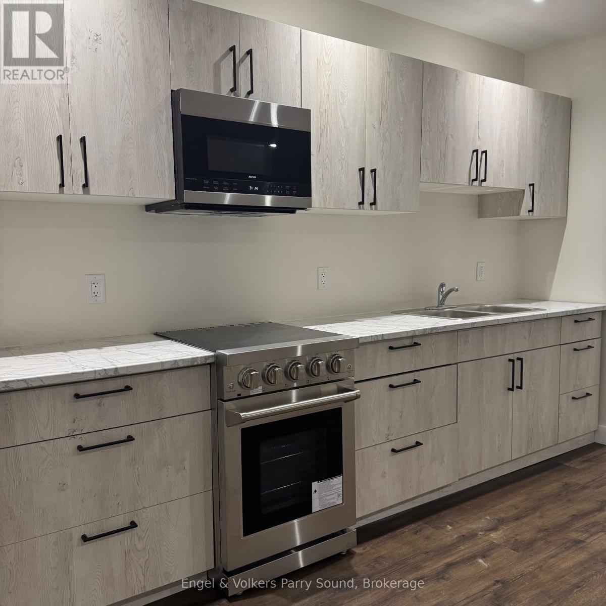 101 - 57 James Street, Parry Sound, ON - Indoor Photo Showing Kitchen With Double Sink