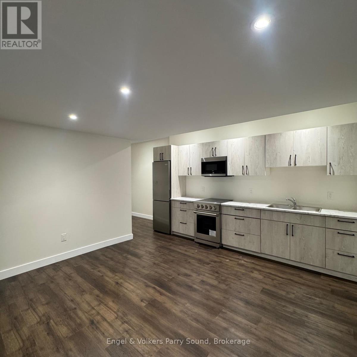 101 - 57 James Street, Parry Sound, ON - Indoor Photo Showing Kitchen With Double Sink