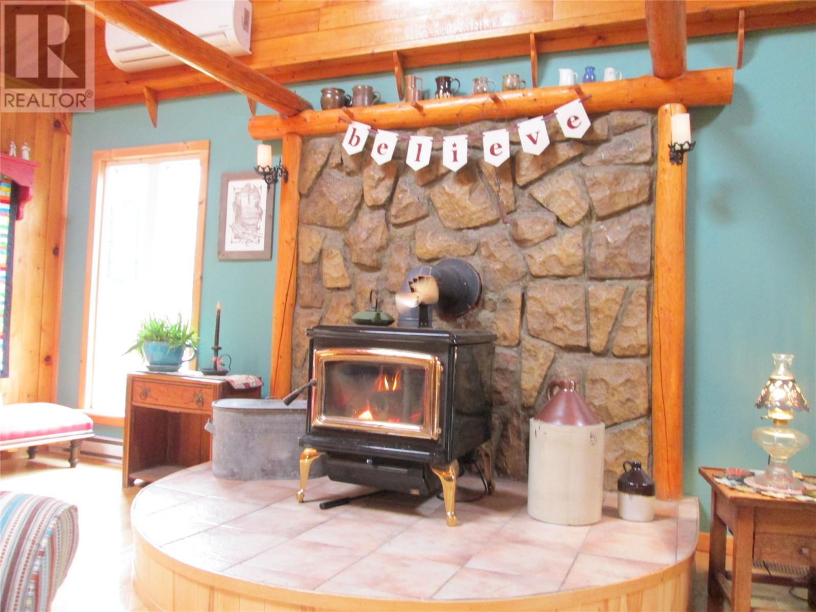 100 Sandy Point Road, Norris Arm, NL - Indoor With Fireplace
