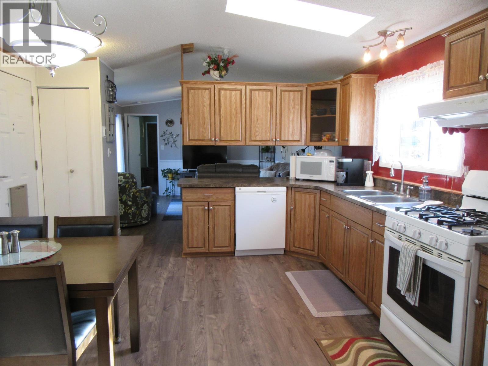 6064 Norman Road, 100 Mile House, BC - Indoor Photo Showing Kitchen With Double Sink