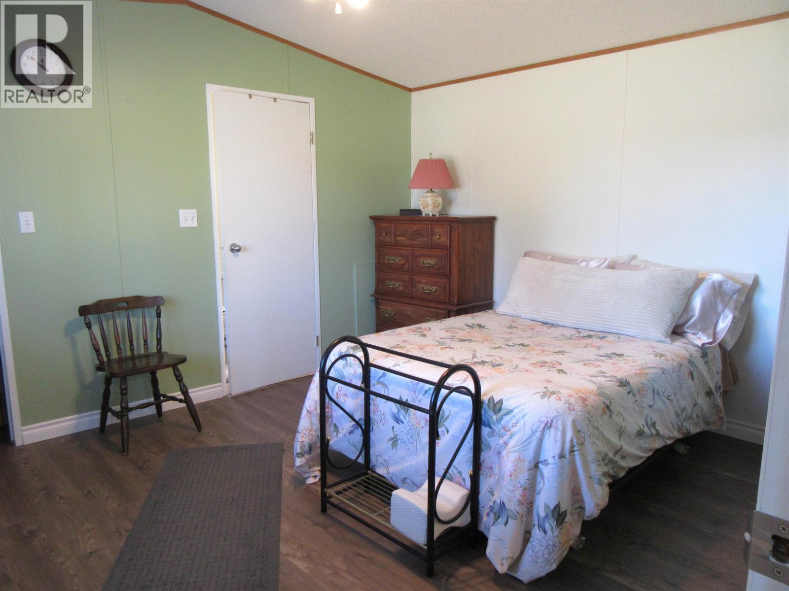 6064 Norman Road, 100 Mile House, BC - Indoor Photo Showing Bedroom