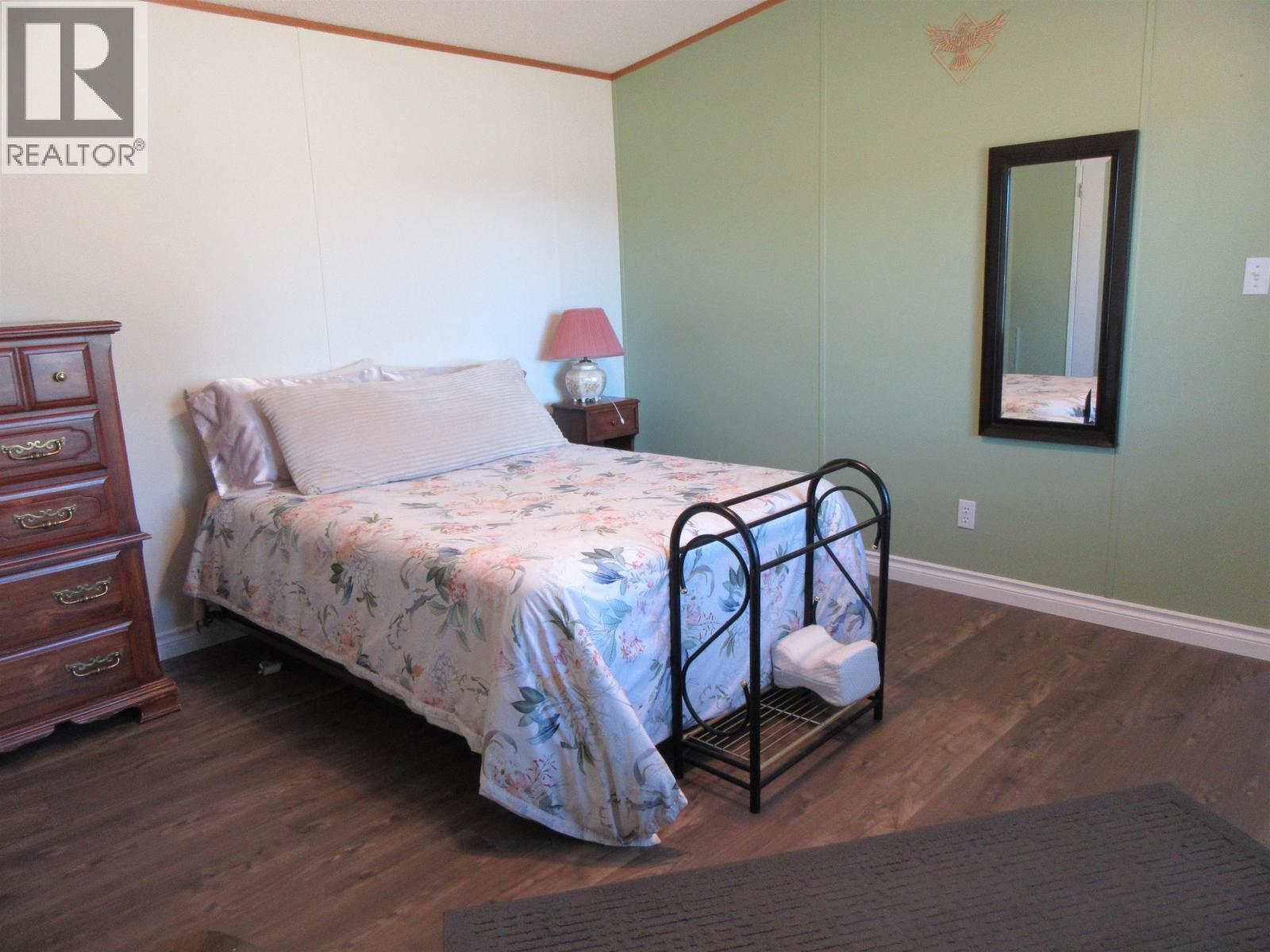 6064 Norman Road, 100 Mile House, BC - Indoor Photo Showing Bedroom