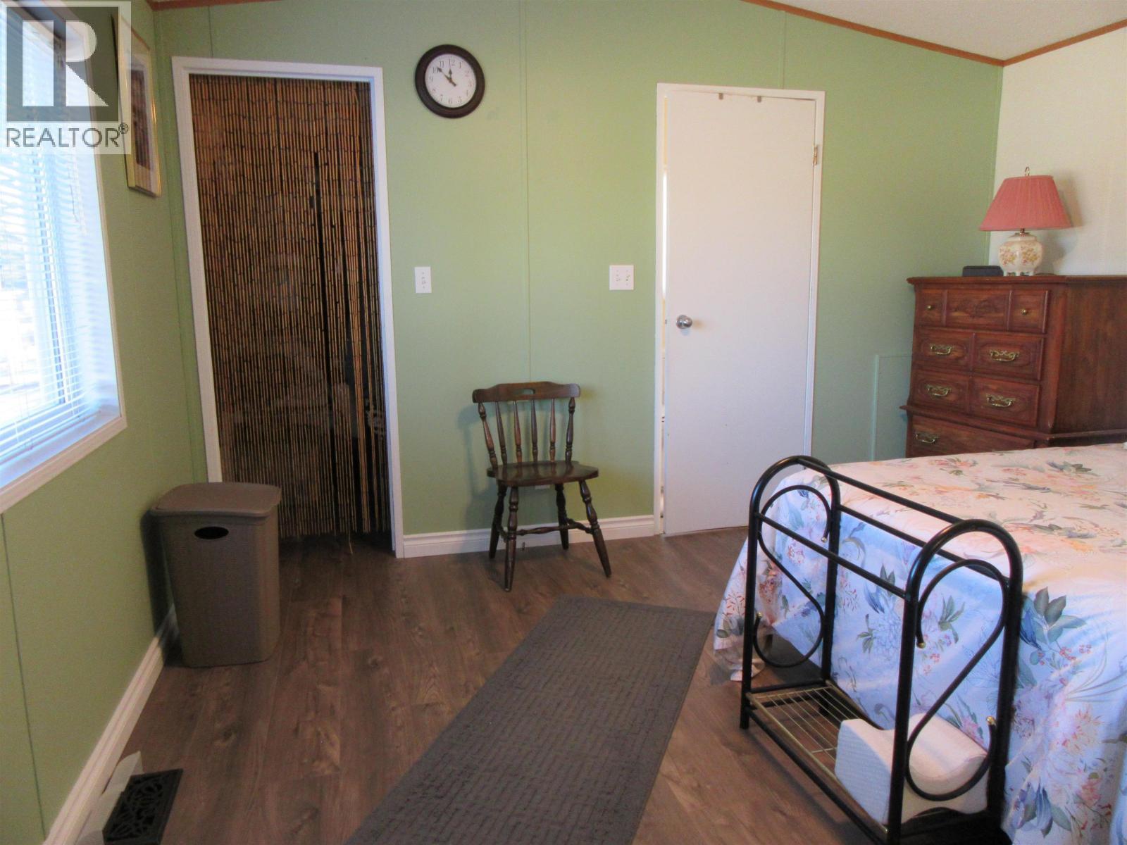 6064 Norman Road, 100 Mile House, BC - Indoor Photo Showing Bedroom