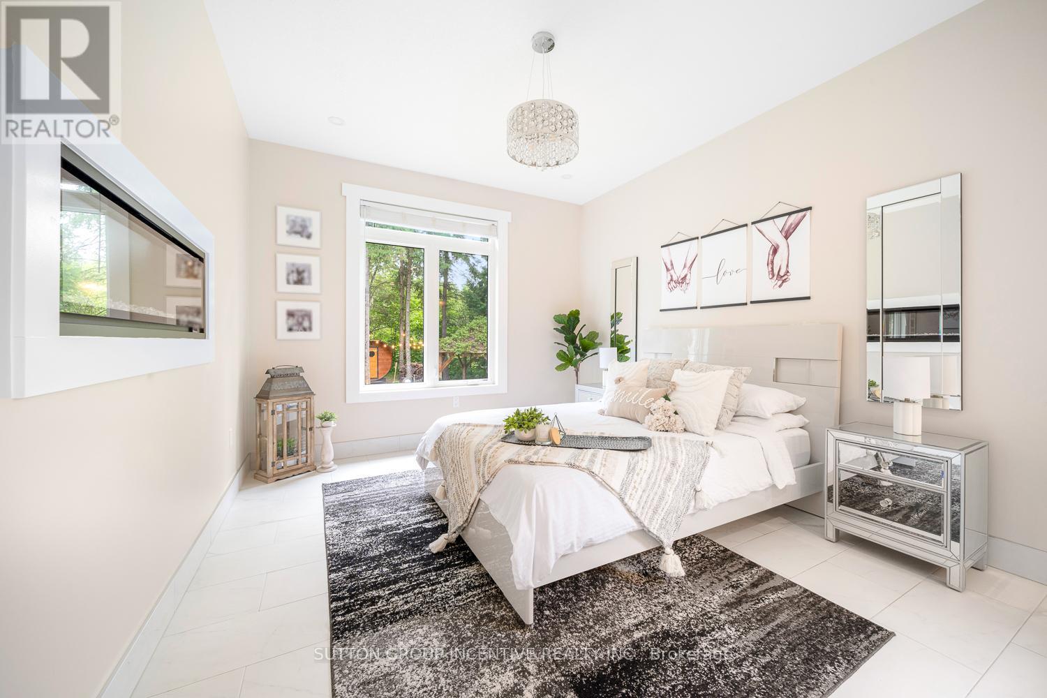 7070 93 Highway, Tiny, ON - Indoor Photo Showing Bedroom