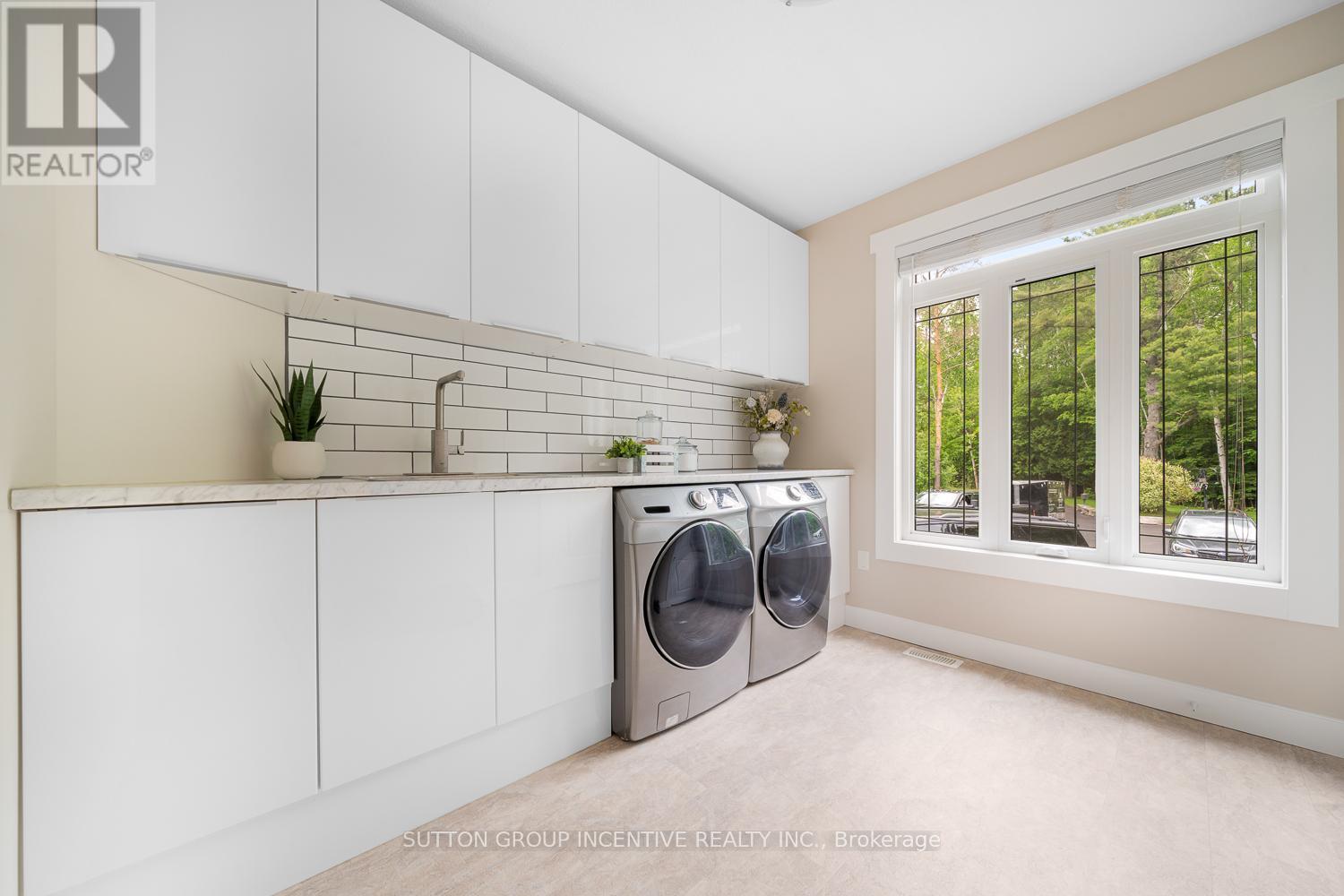 7070 93 Highway, Tiny, ON - Indoor Photo Showing Laundry Room