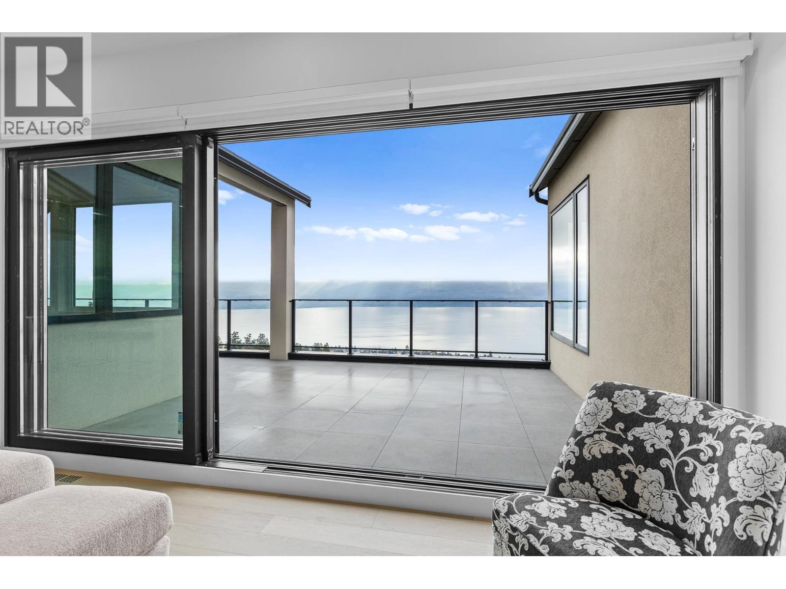 12' space open to the outdoors - 1359 Vineyard Drive, West Kelowna, BC - With Body Of Water