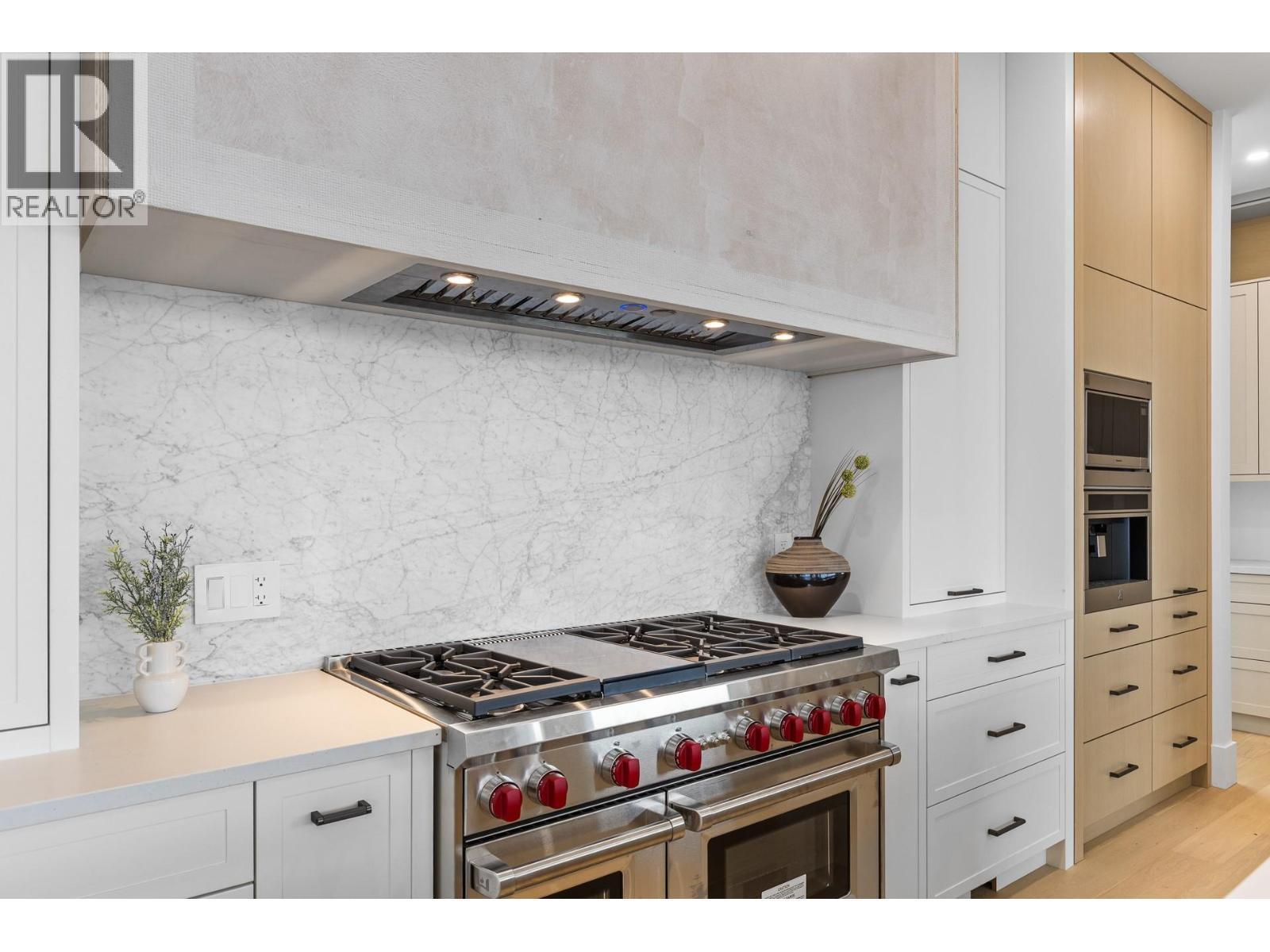 Chefs kitchen with 48"" Wolf range - 1359 Vineyard Drive, West Kelowna, BC - Indoor Photo Showing Kitchen With Upgraded Kitchen