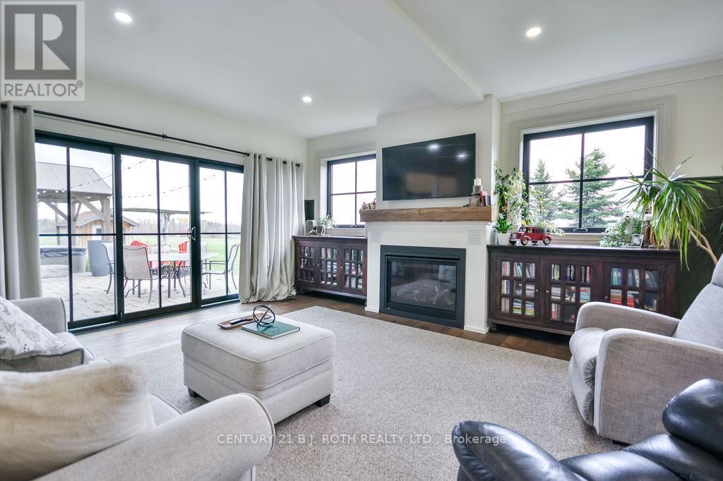1803 Old Second Road N, Springwater, ON - Indoor Photo Showing Living Room With Fireplace
