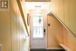 Stairs to Side Entrance and Basement -