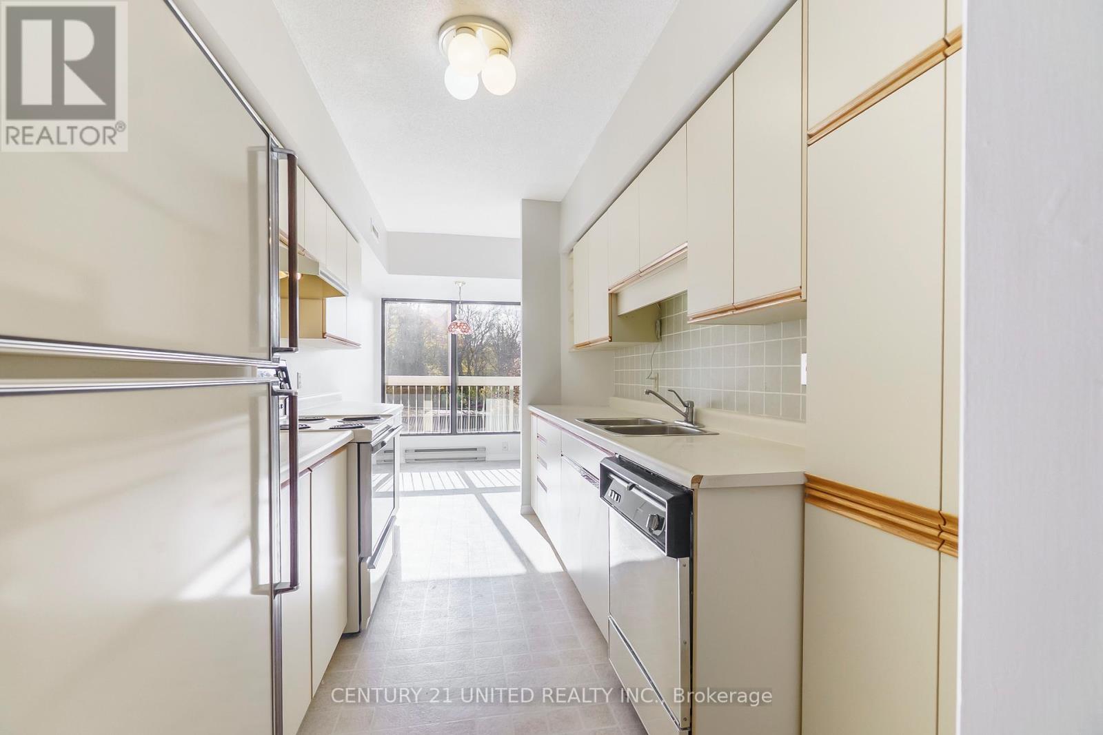 208 - 40 Auburn Street, Peterborough (Ashburnham Ward 4), ON - Indoor Photo Showing Kitchen With Double Sink