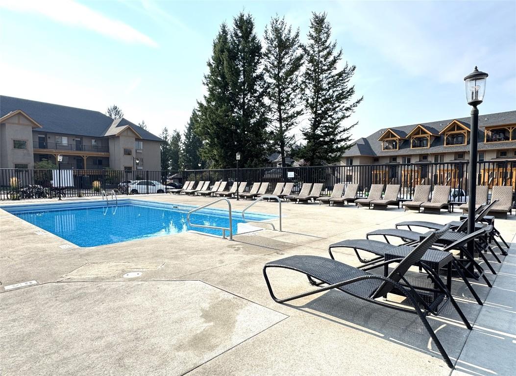 211D-200 Bighorn Boulevard, Radium Hot Springs, BC - Outdoor With In Ground Pool