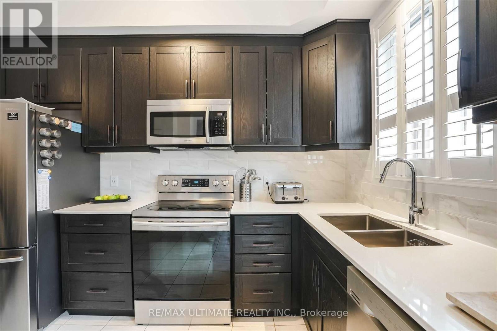 290 - 30 Times Square Boulevard, Hamilton, ON - Indoor Photo Showing Kitchen With Double Sink With Upgraded Kitchen