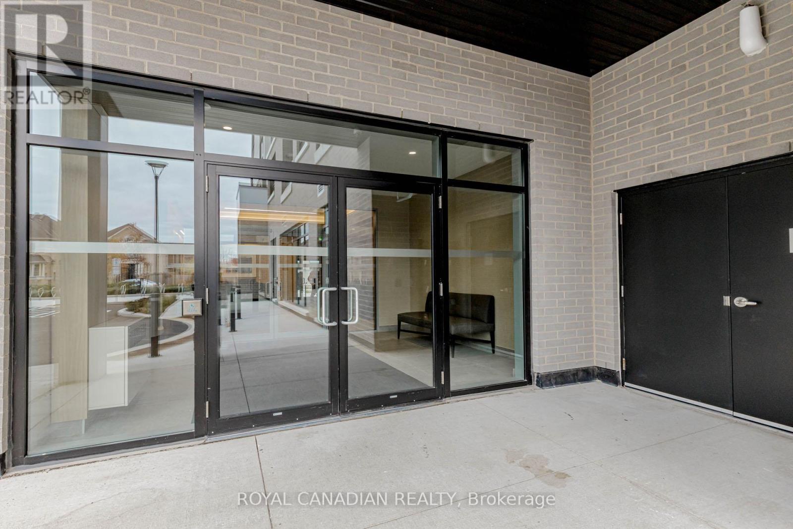 306 - 3250 Carding Mill Trail, Oakville, ON - Outdoor With Exterior