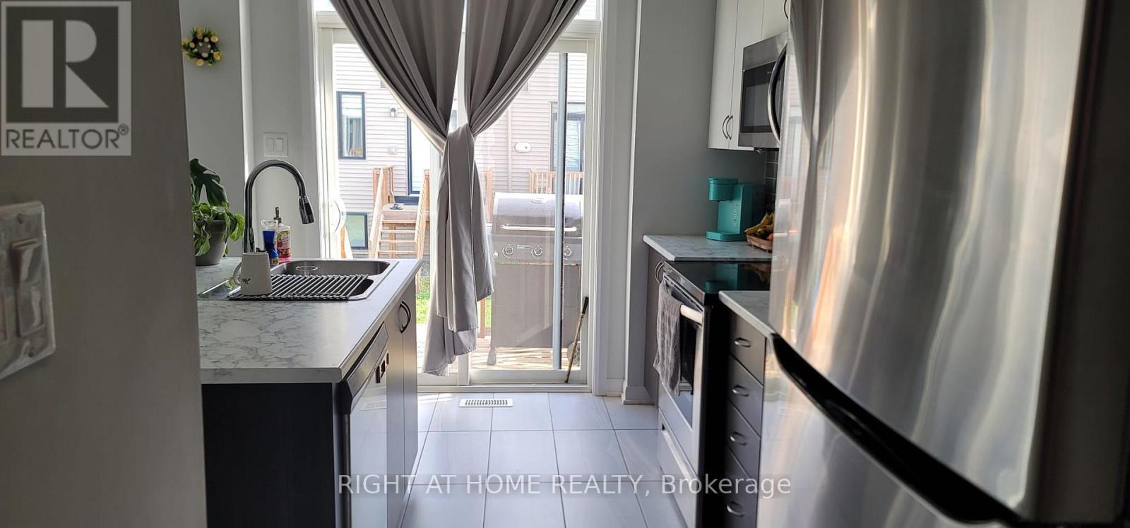 61 Teelin Circle, Ottawa, ON - Indoor Photo Showing Kitchen With Stainless Steel Kitchen With Double Sink