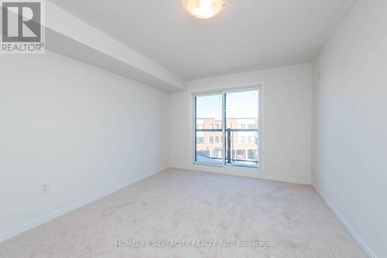 # 2 - 24 Humberwood Boulevard, Toronto, ON - Indoor Photo Showing Other Room