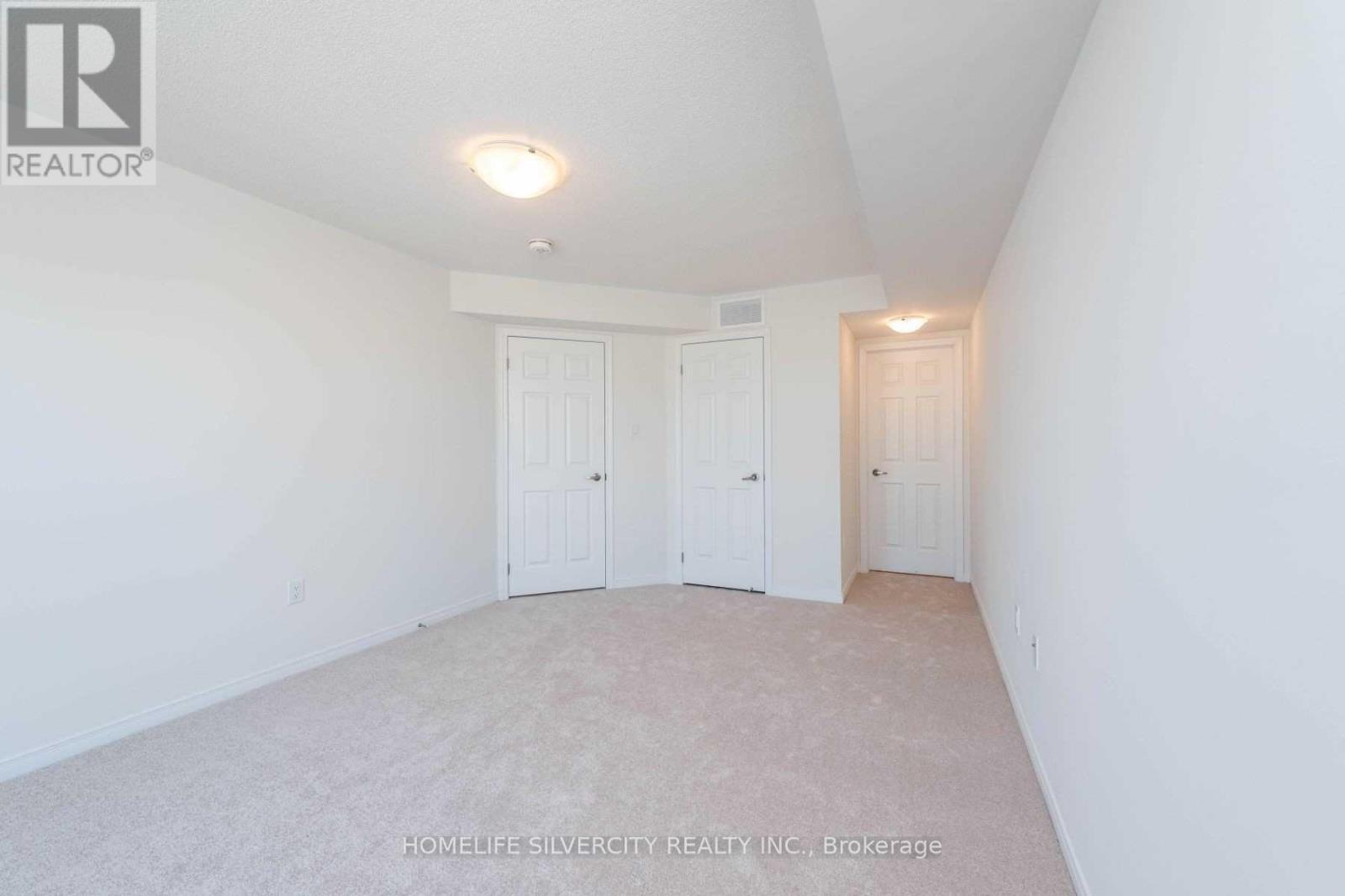 # 2 - 24 Humberwood Boulevard, Toronto, ON - Indoor Photo Showing Other Room