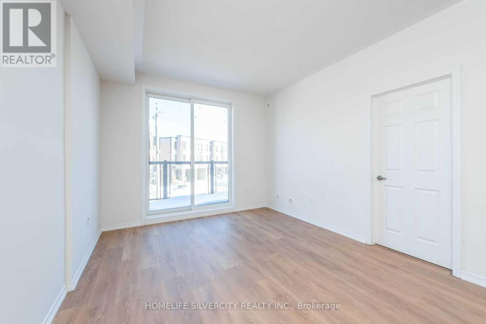 # 2 - 24 Humberwood Boulevard, Toronto, ON - Indoor Photo Showing Other Room