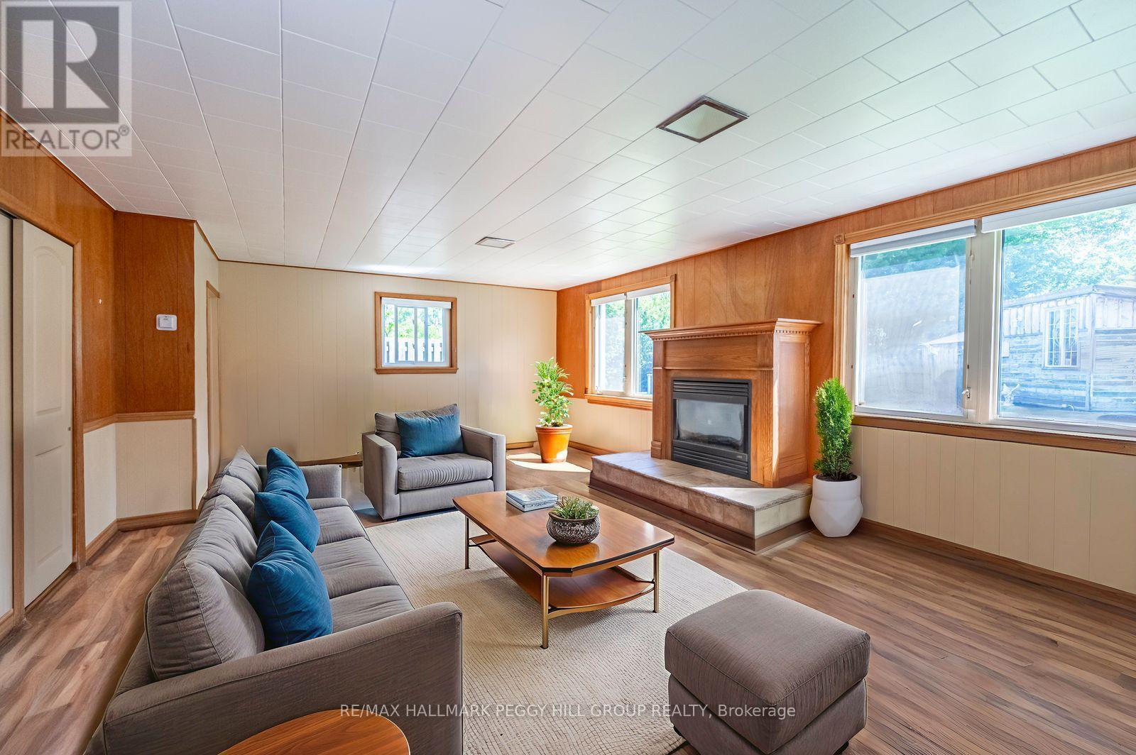2139 Adjala-Tecumseth Townline, New Tecumseth, ON - Indoor Photo Showing Living Room With Fireplace